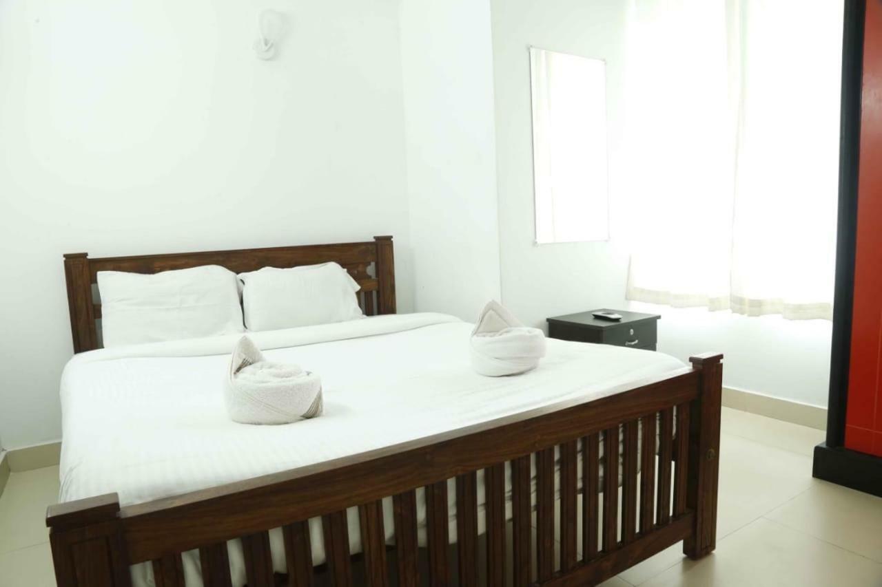Traven Homes Infopark Kakkanad Corporate Suit Rooms Kochi Exterior foto