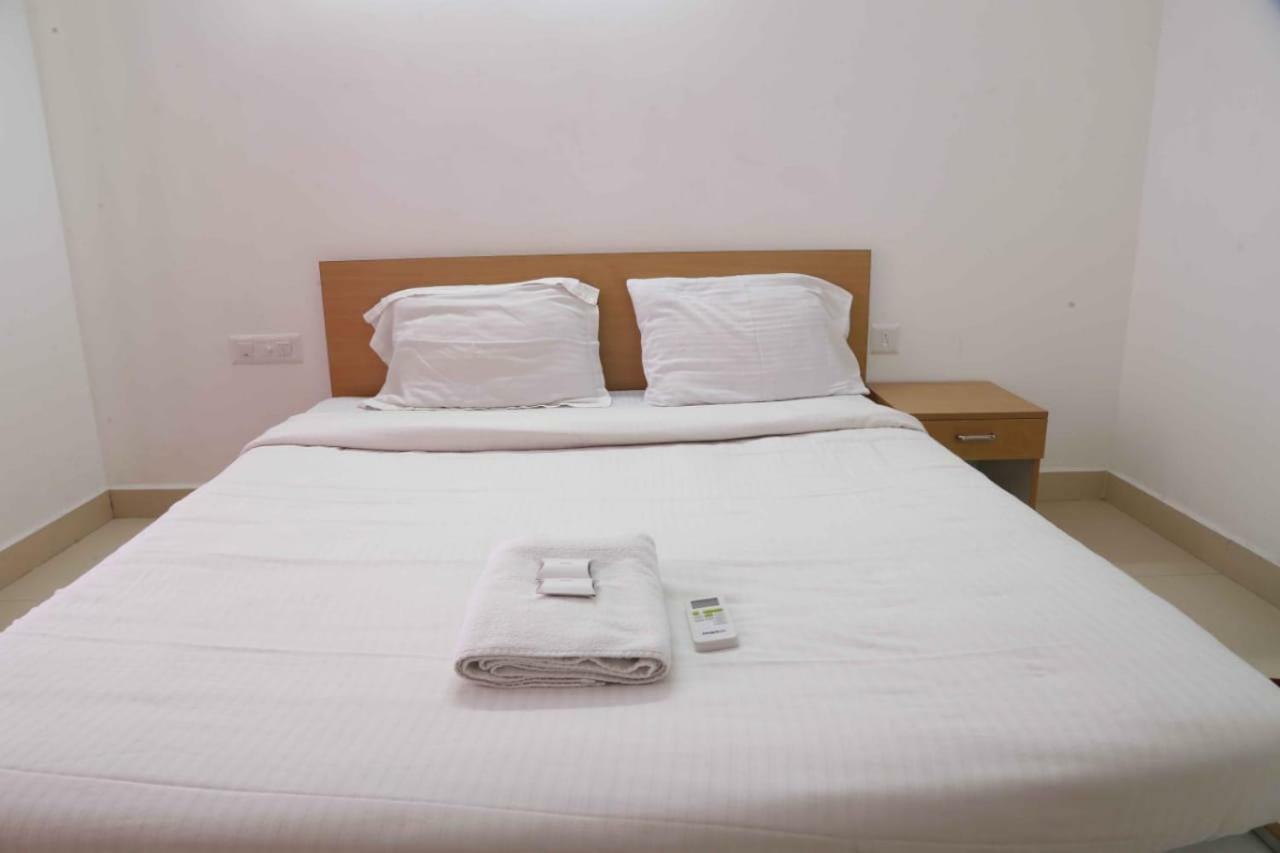 Traven Homes Infopark Kakkanad Corporate Suit Rooms Kochi Exterior foto